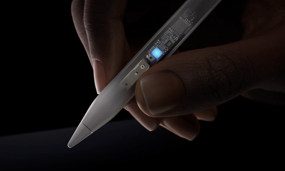 Apple Pencil magnetically attached to an iPad, representing the rumored 2027 battery upgrade.